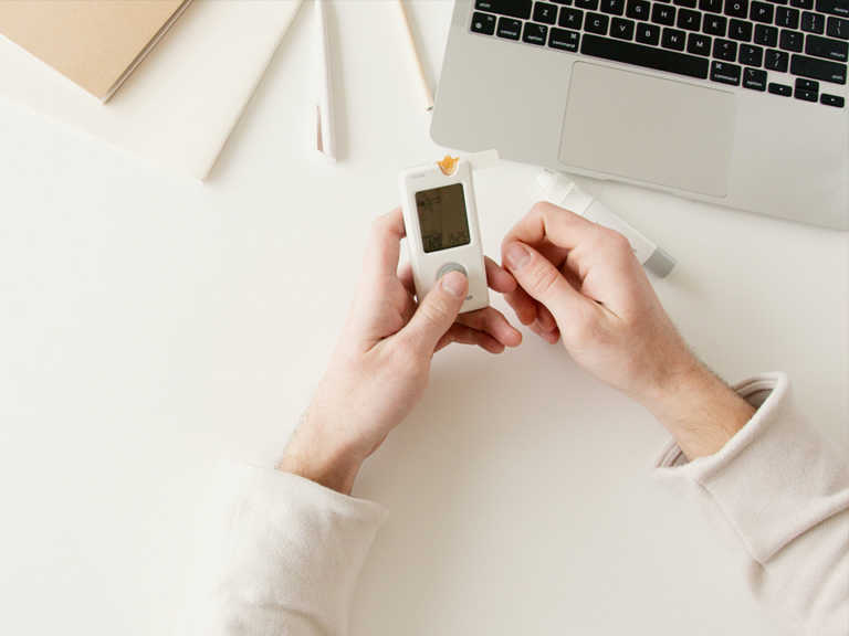 glucose monitor being used