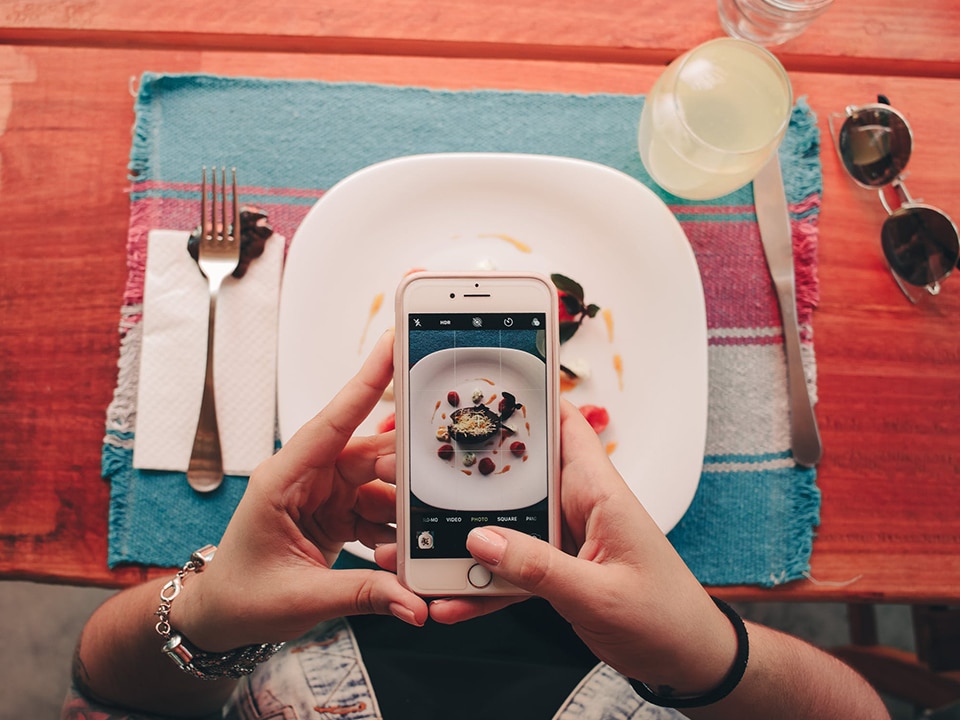 taking photo of dessert plate with an iphone